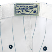 Cream Drew Pearson label with blue lettering inside the white New York Yankees cap