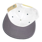 Interior view of the Tennessee Titans hat showing gray underbrim and white crown panels