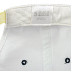 White one-size label stitched to the inner sweatband of the Tennessee Titans cap