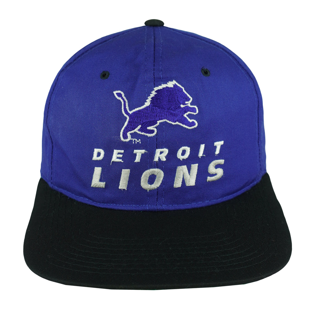 Front view of the blue, black, and green 1990s NFL Detroit Lions color-block snapback hat by New Era