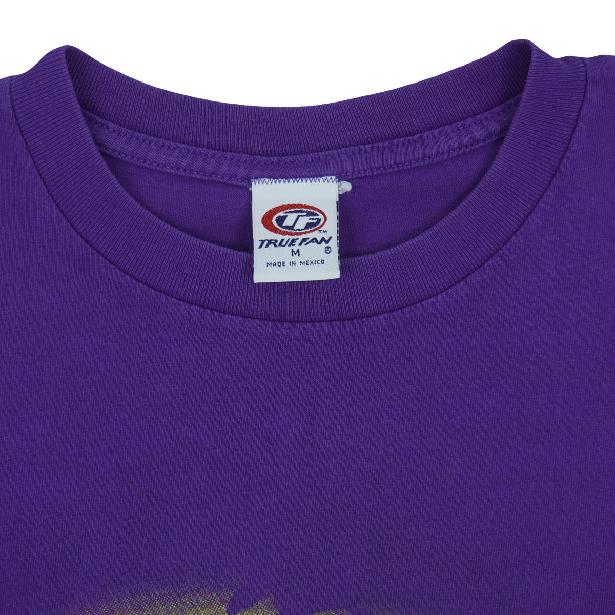 Close view of the True Fan label inside the purple Tampa Bay Devil Rays 2000 t-shirt