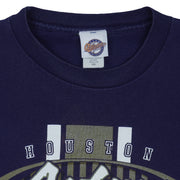 Aaron maker label showing XXL inside the navy Astros T-shirt neckline