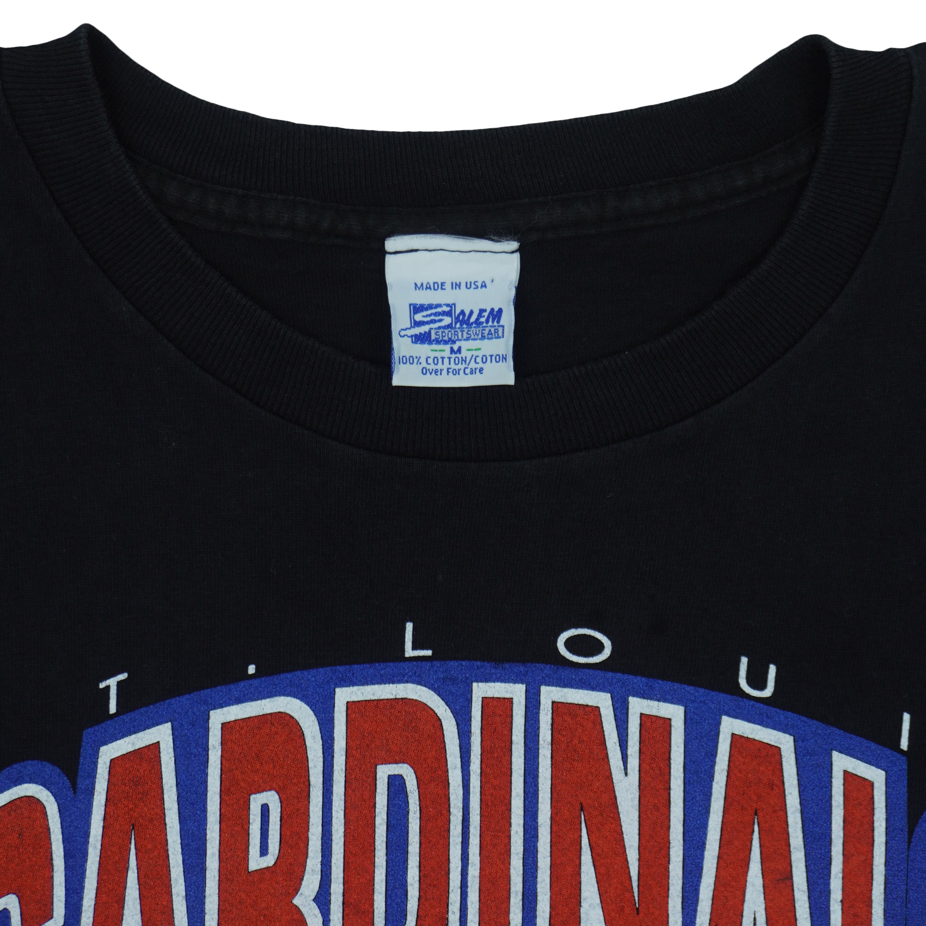Close view of the label partially legible label inside the black St. Louis Cardinals 1993 Central Division t-shirt