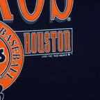Houston lettering with Logo 7 and MLB 1993 copyright printed on navy fabric