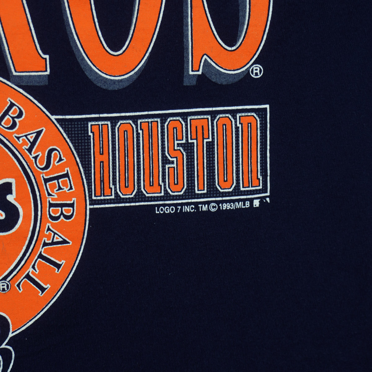 Houston lettering with Logo 7 and MLB 1993 copyright printed on navy fabric