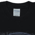 Close view of the Gildan Activewear Ultra Cotton label inside the black New York Yankees vs Mets Subway Series t-shirt