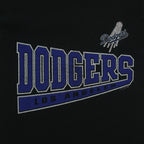 Large blue Dodgers lettering and small script logo on the black T-shirt