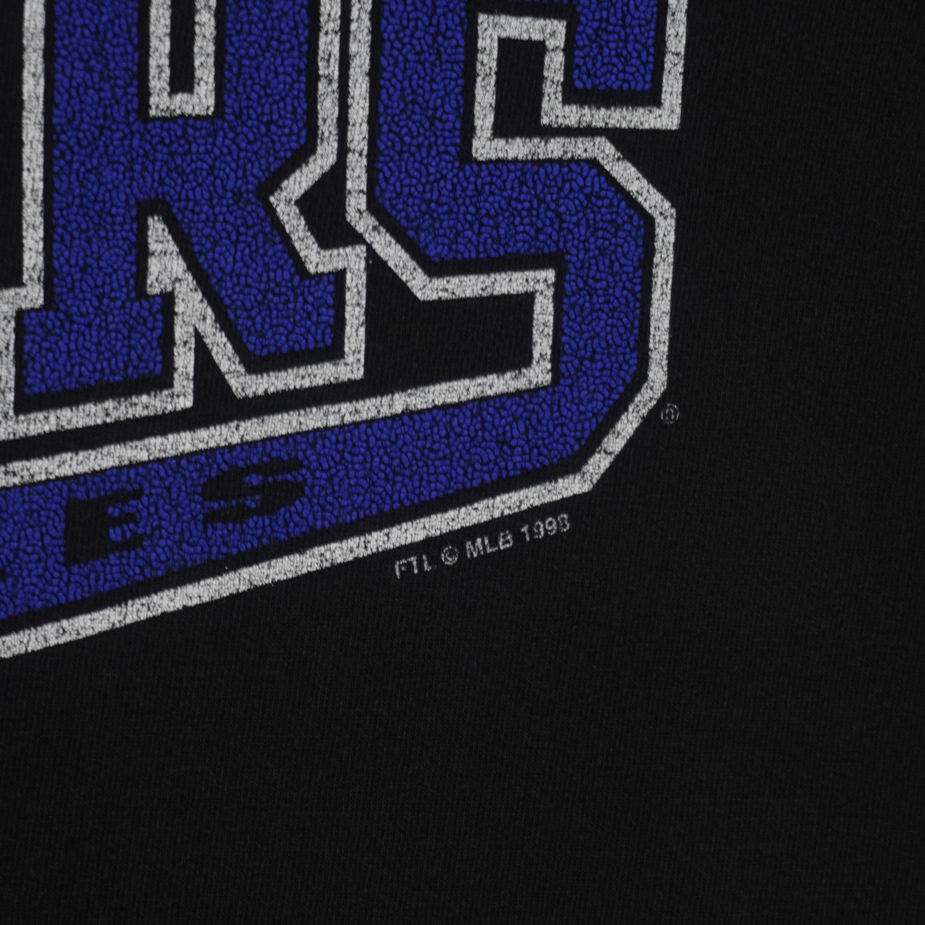 Close view of the Dodgers print texture and MLB 1998 copyright