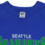Close view of the Trench Manufacturing label inside the royal blue Seattle Seahawks 1988 AFC West Champions sweatshirt