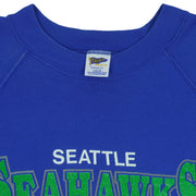 Close view of the Trench Manufacturing label inside the royal blue Seattle Seahawks 1988 AFC West Champions sweatshirt