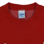 Close view of the Salem Sportswear label inside the red Detroit Red Wings Logo sweatshirt