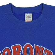 Fruit of the Loom XL label inside the blue Toronto Blue Jays sweatshirt