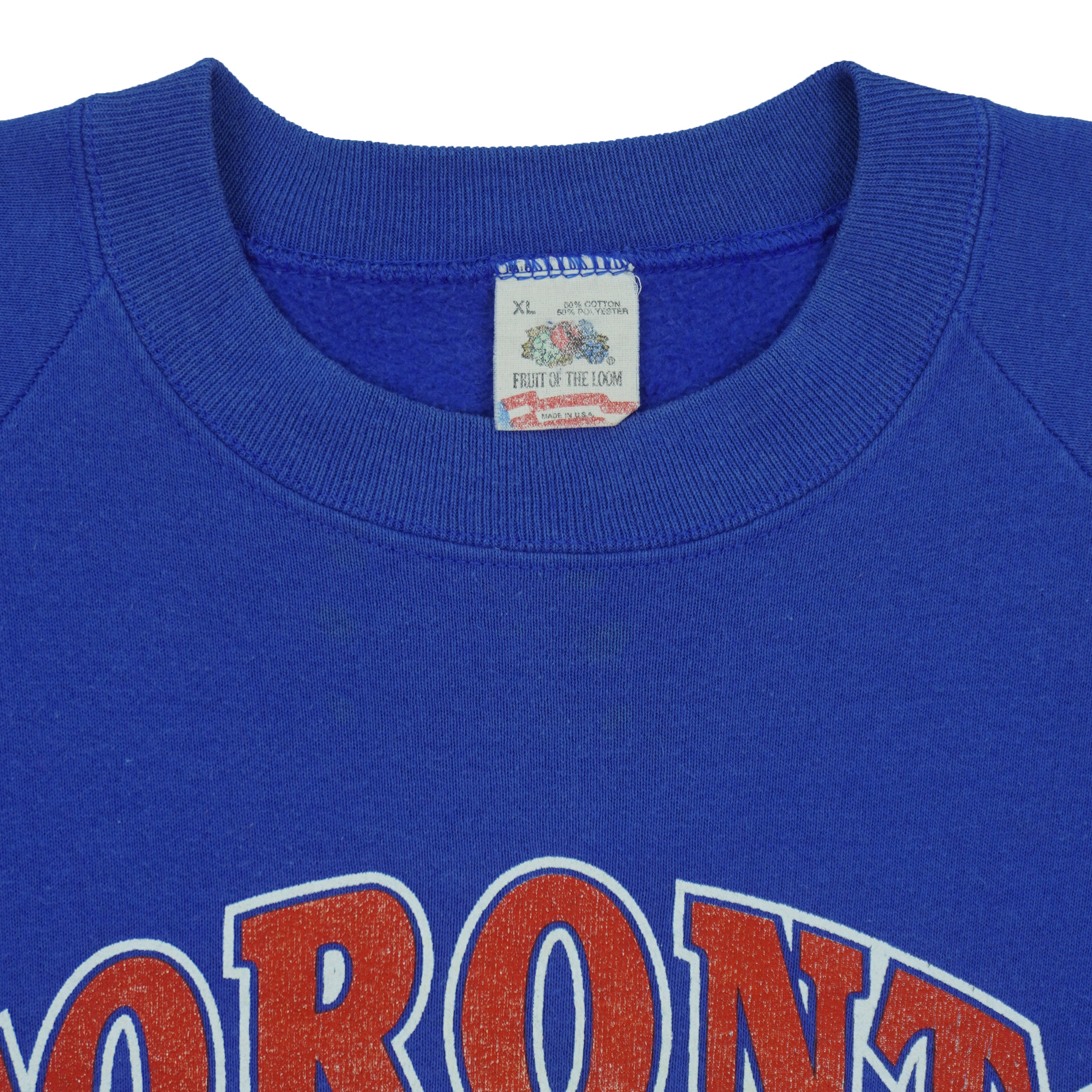 Fruit of the Loom XL label inside the blue Toronto Blue Jays sweatshirt