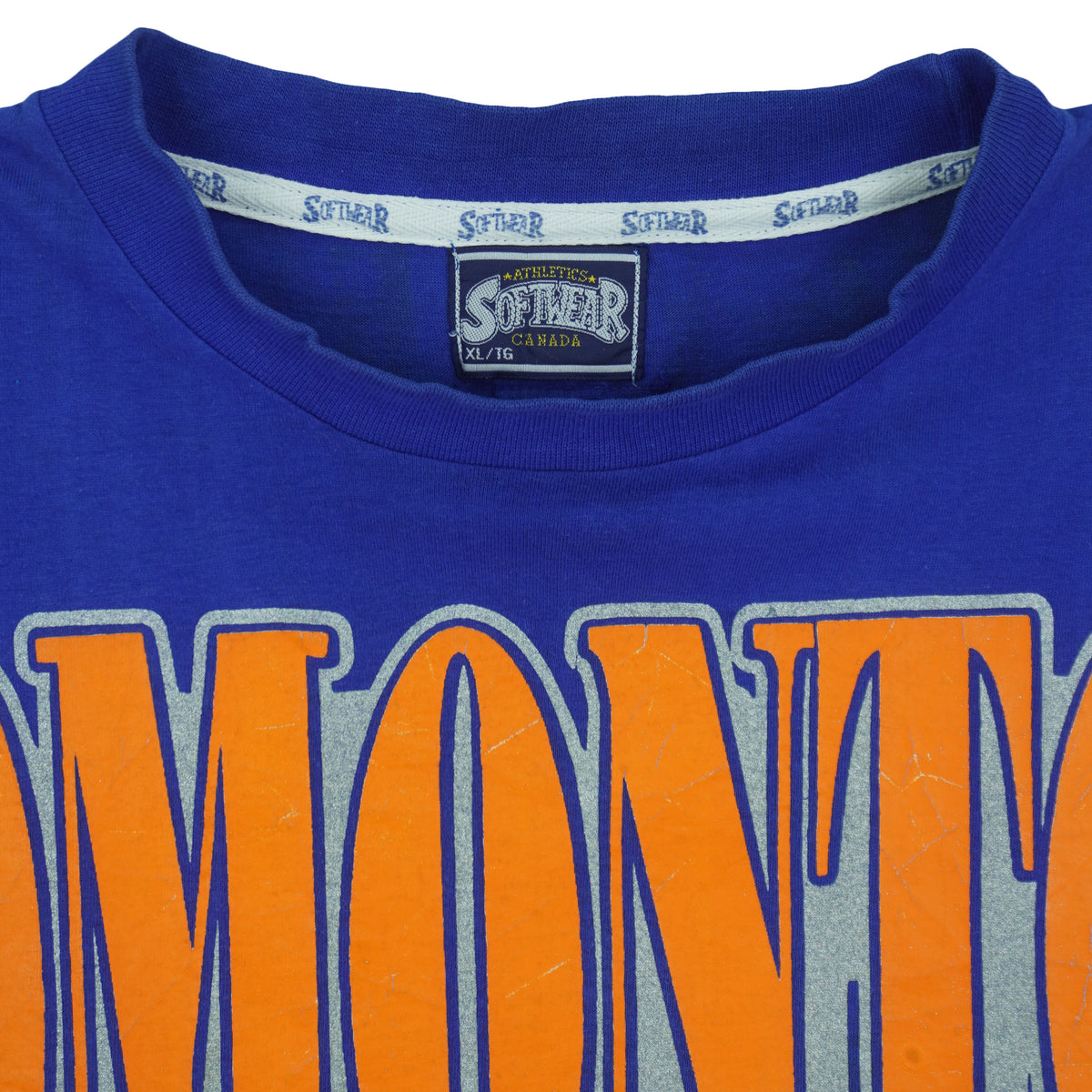 Softwear Athletics neck label close-up of the blue Edmonton Oilers double-sided graphic T-shirt
