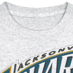 Neck label close-up of the gray Jacksonville Jaguars inaugural season T-shirt