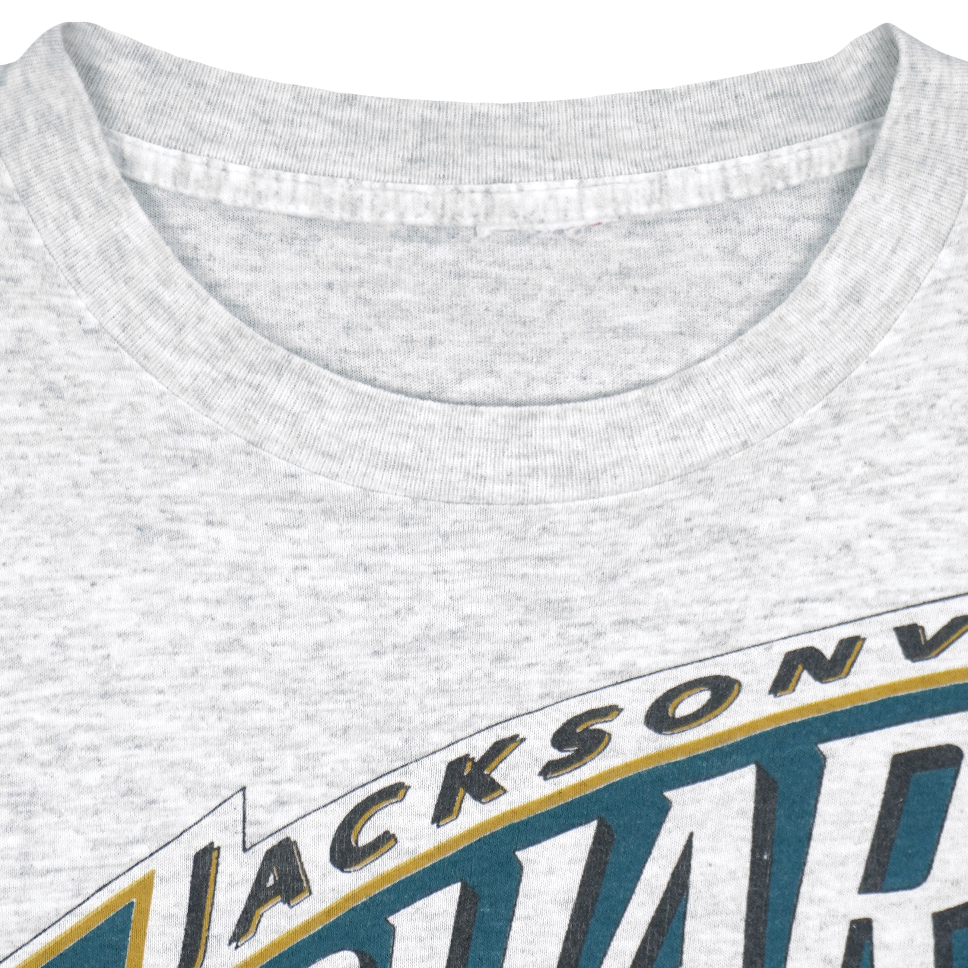 Neck label close-up of the gray Jacksonville Jaguars inaugural season T-shirt