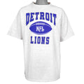 Gray T-shirt with Detroit Lions football and blue team lettering