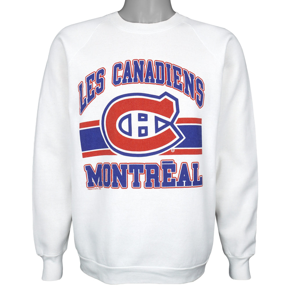 White sweatshirt with large red and blue Montreal Canadiens emblem