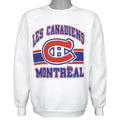 White sweatshirt with large red and blue Montreal Canadiens emblem