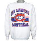 White sweatshirt with large red and blue Montreal Canadiens emblem
