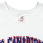 Neck and maker label close-up of the white Montreal Canadiens 1988 logo sweatshirt