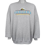 Gray Jaguars sweatshirt front showing the embroidered lettering and ribbed cuffs