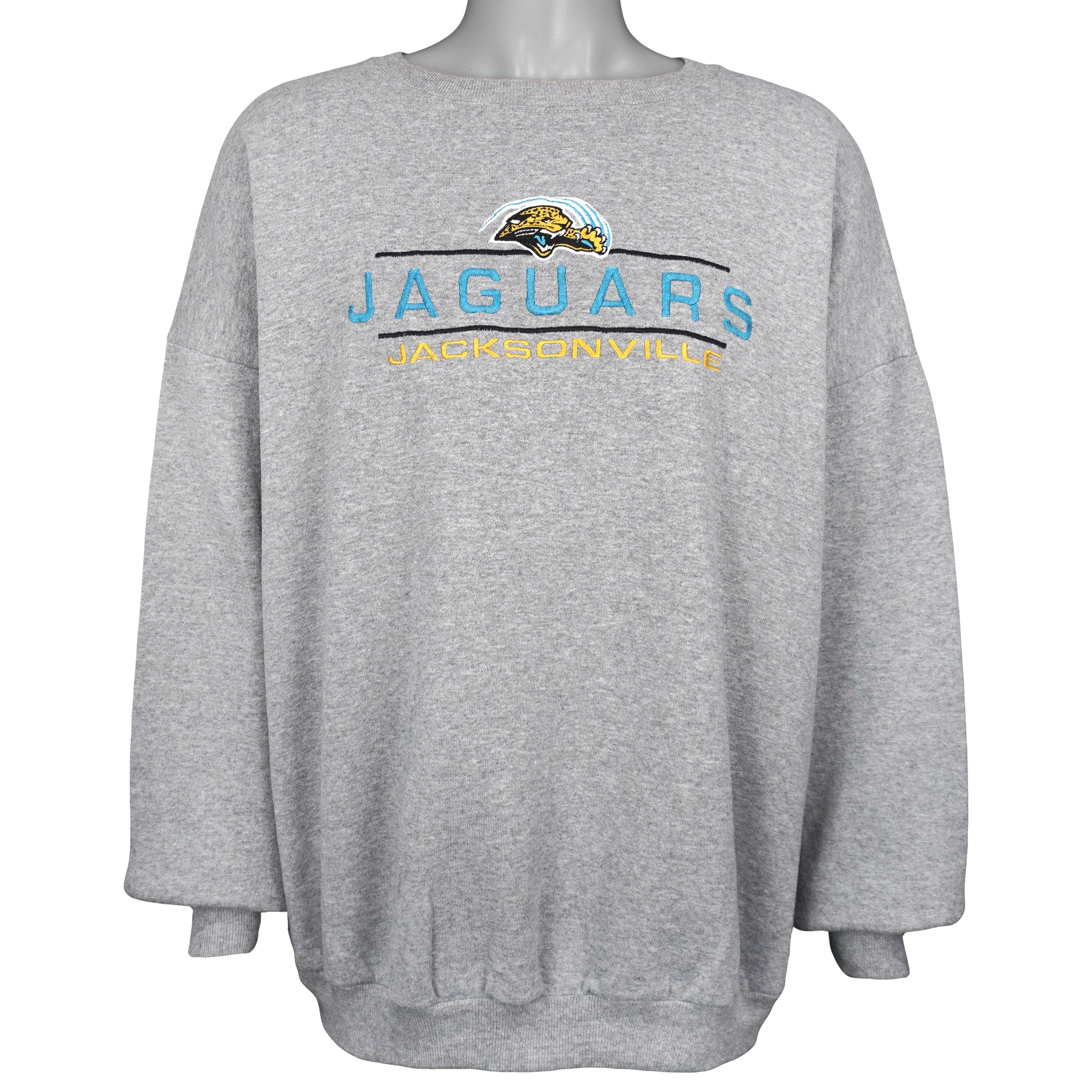 Gray Jaguars sweatshirt front showing the embroidered lettering and ribbed cuffs