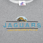 Embroidered Jaguars wordmark and jaguar-head logo on gray fabric