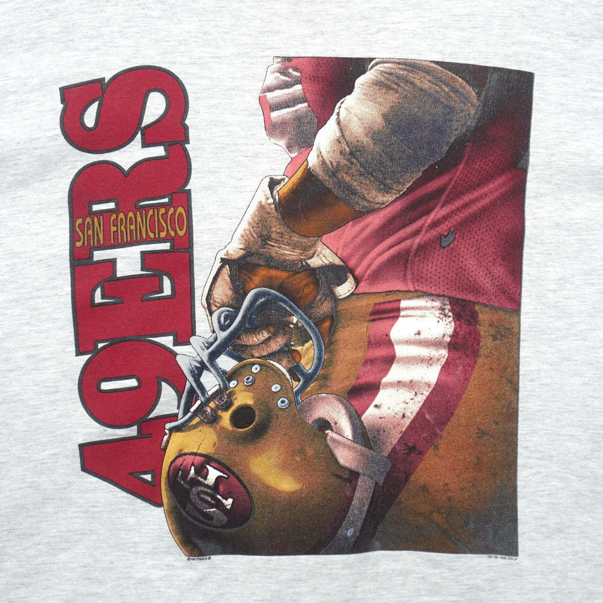 Construction detail close-up of the gray San Francisco 49ers player montage T-shirt
