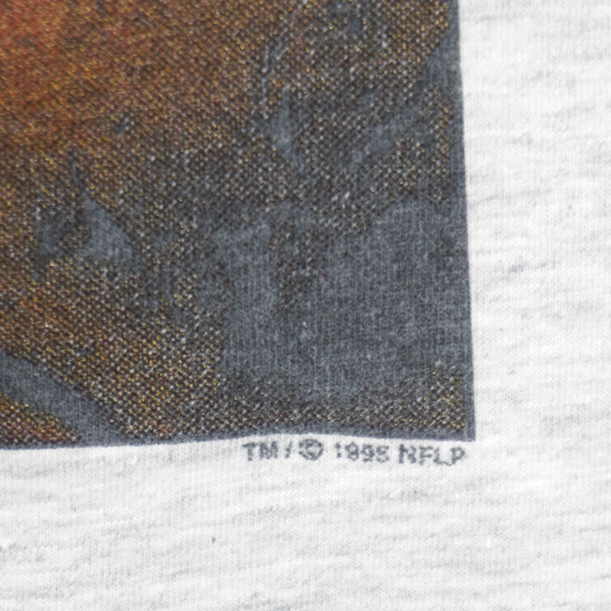 Visible wear detail close-up of the gray San Francisco 49ers player montage T-shirt