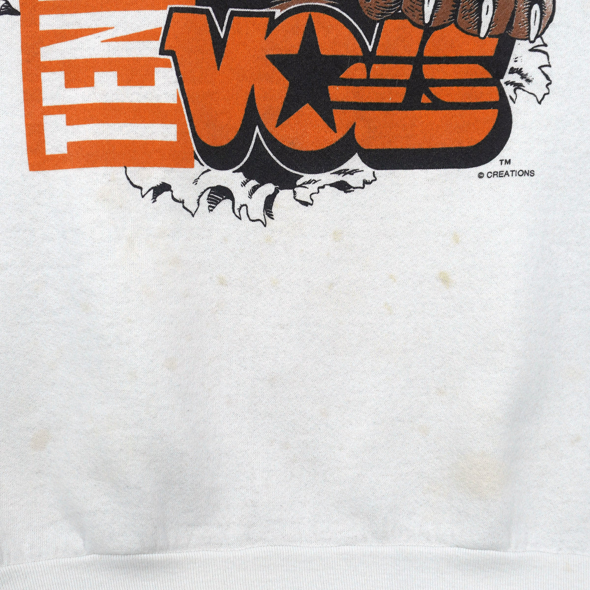 White Tennessee sweatshirt front with tan stains under the orange bear graphic