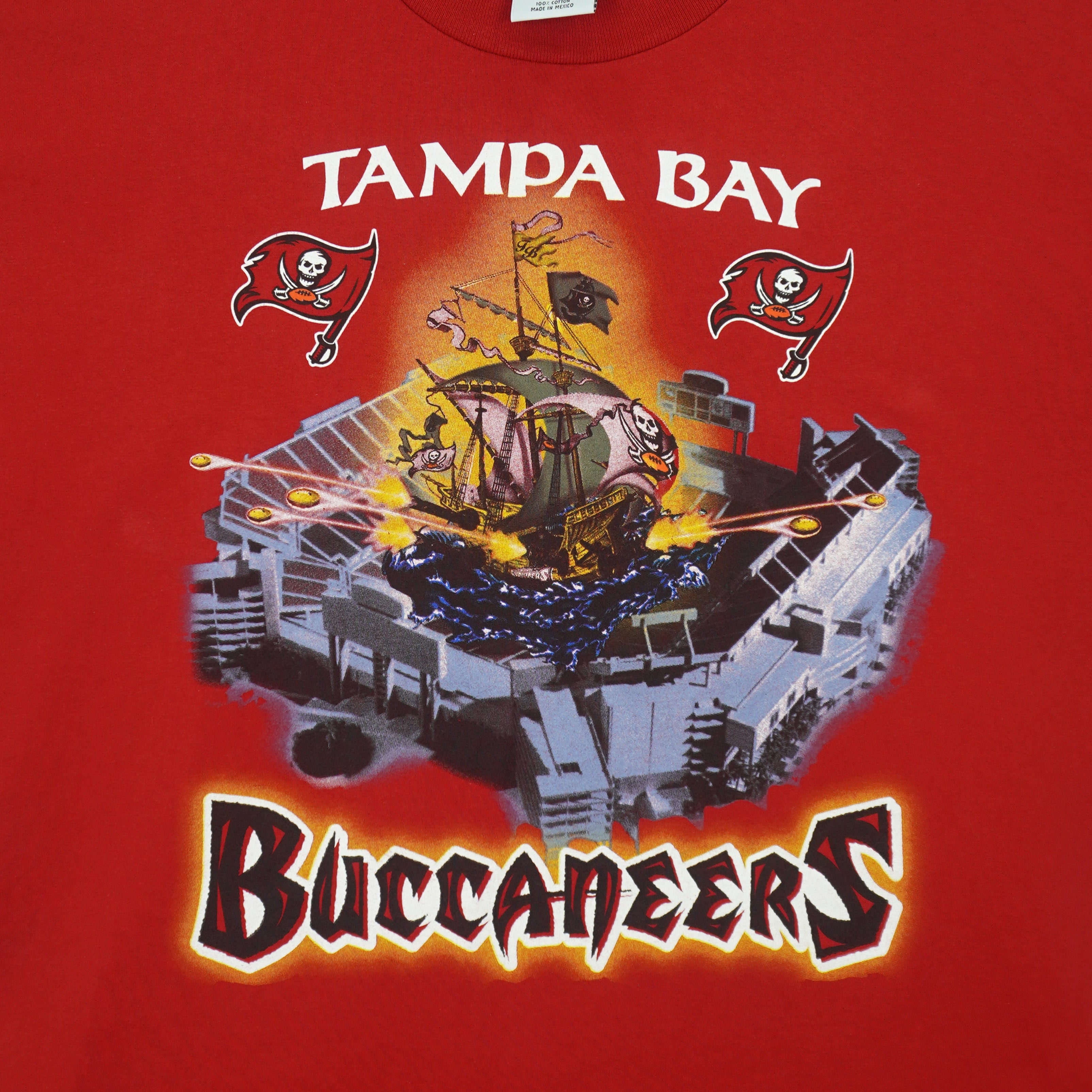 Tampa Bay Buccaneers pirate ship graphic closeup with flag logos on red fabric