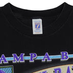 Close view of Logo 7 size label on the black Tampa Bay Devil Rays Evil Rays short sleeve graphic T-shirt