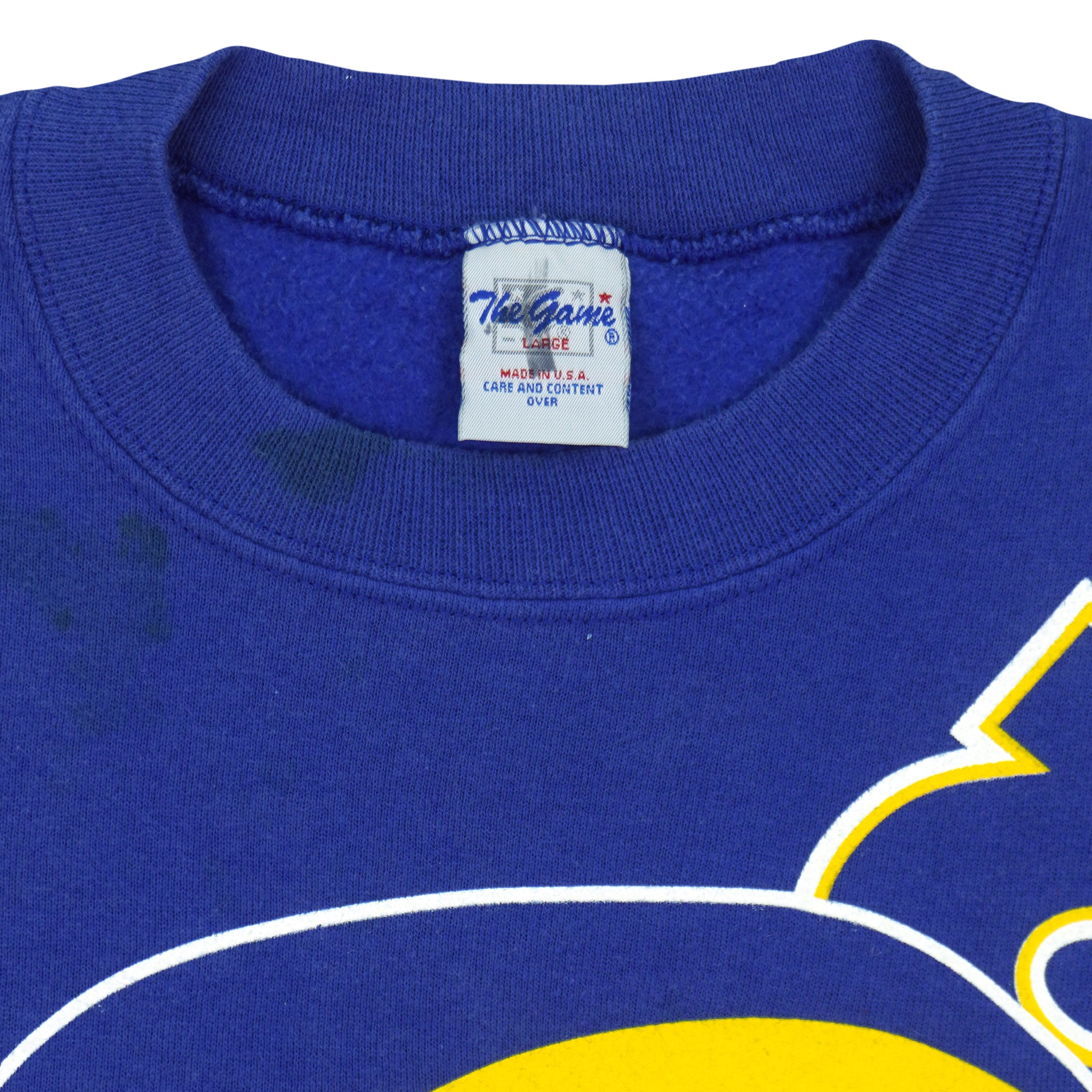The Game large size label stitched inside the blue sweatshirt neckline