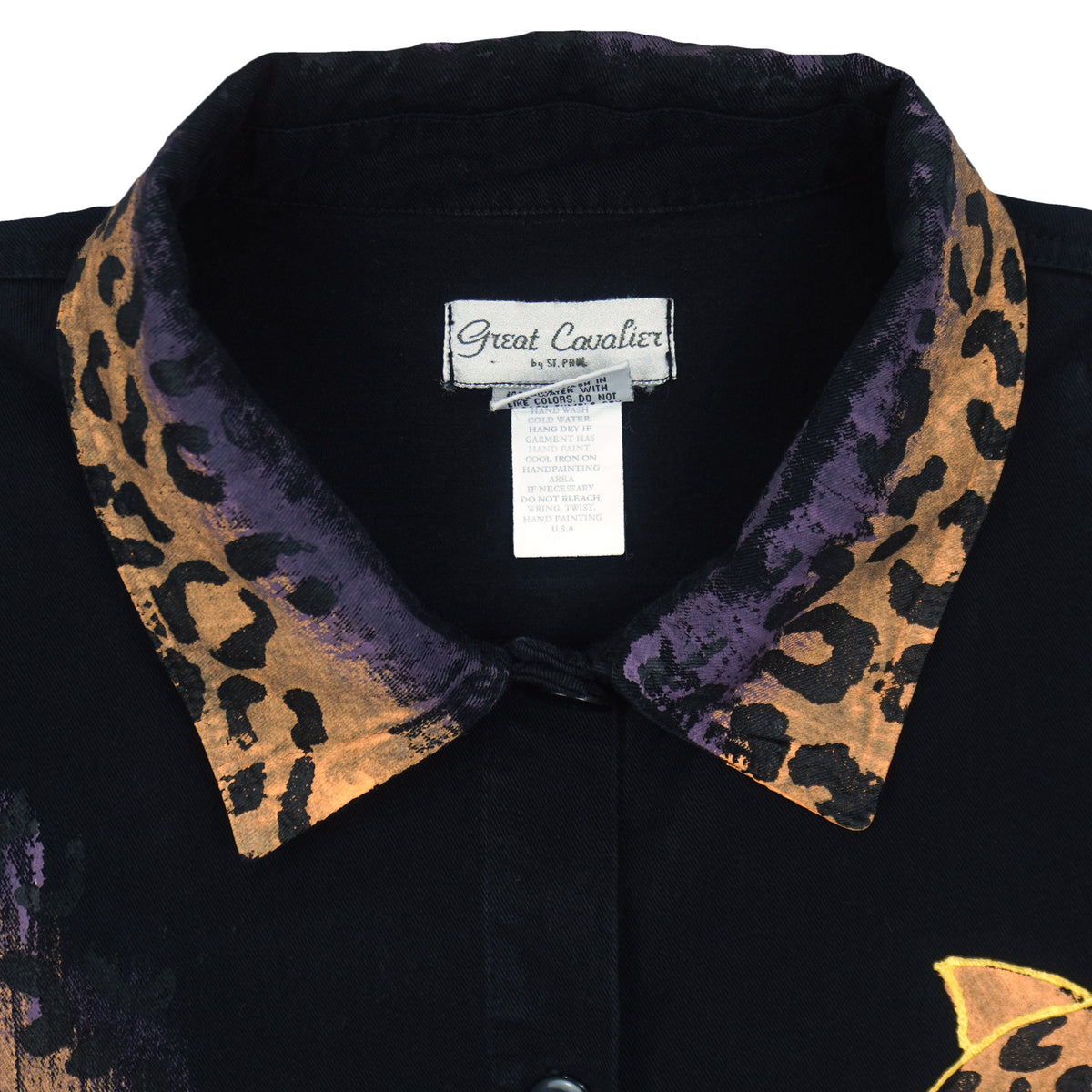 Great Cavalier neck label on the black leopard graphic button-up shirt