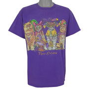 Purple New Orleans T-shirt front with colorful Mardi Gras cats and gold lettering