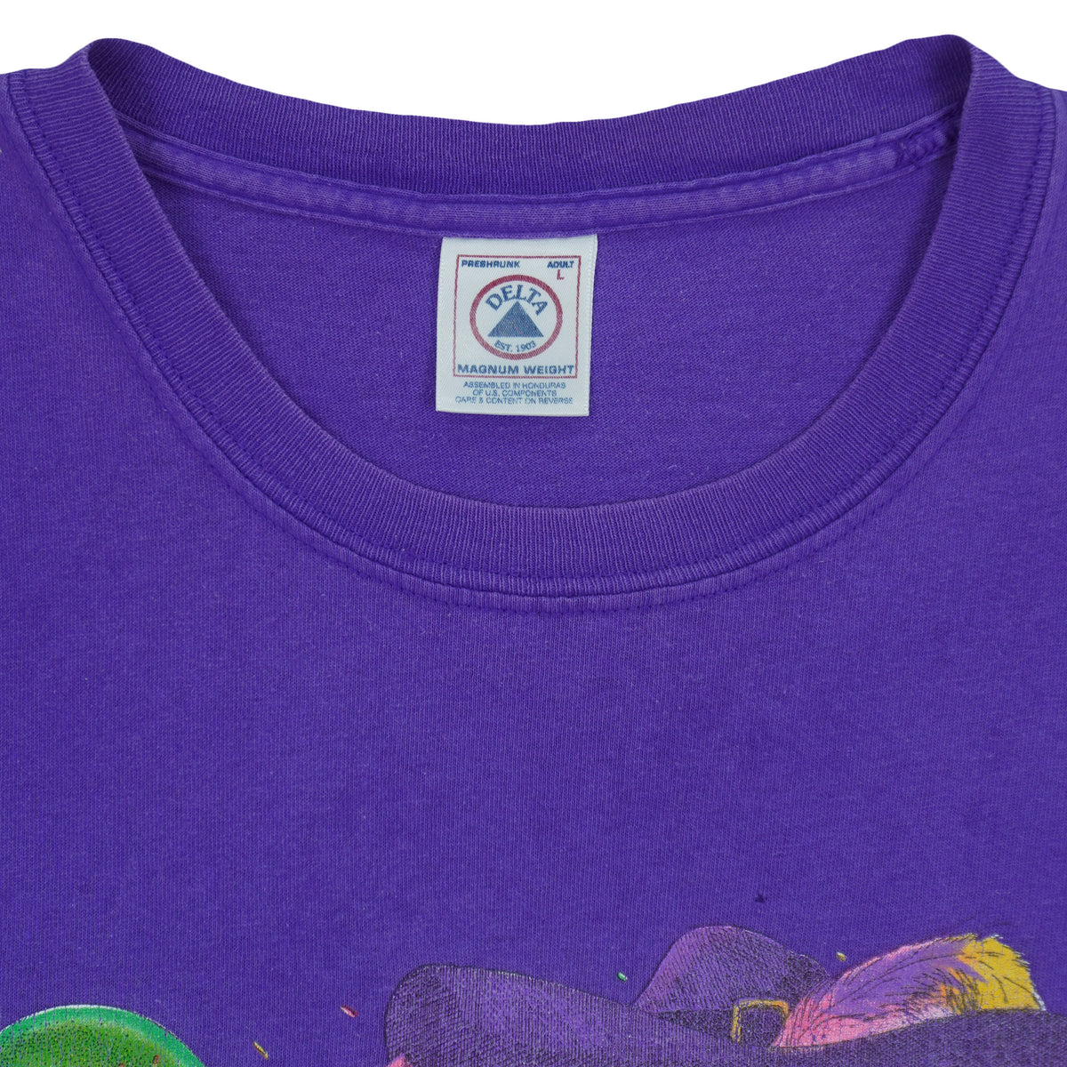 Purple ribbed collar with a white Delta neck label