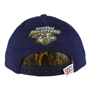 Navy cap rear with Nashville Predators logo and snap closure