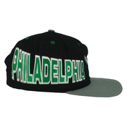 Right-side view showing large Philadelphia lettering around the Eagles cap