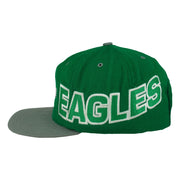 Left-side view showing large Eagles lettering across the green crown panel