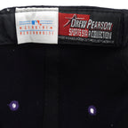 Close-up of the MLB and Drew Pearson Sports Headwear woven label set inside the cap