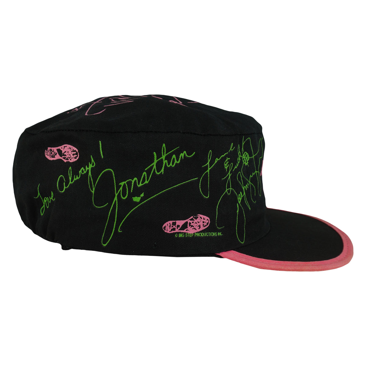 Right side of the New Kids on the Block cap with green signatures and pink footprints