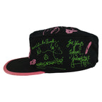 Left side of the New Kids on the Block cap with AOP green signatures and pink graphics