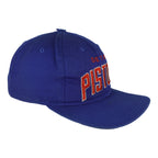 Angled view of blue Pistons cap with red and white embroidered wordmark