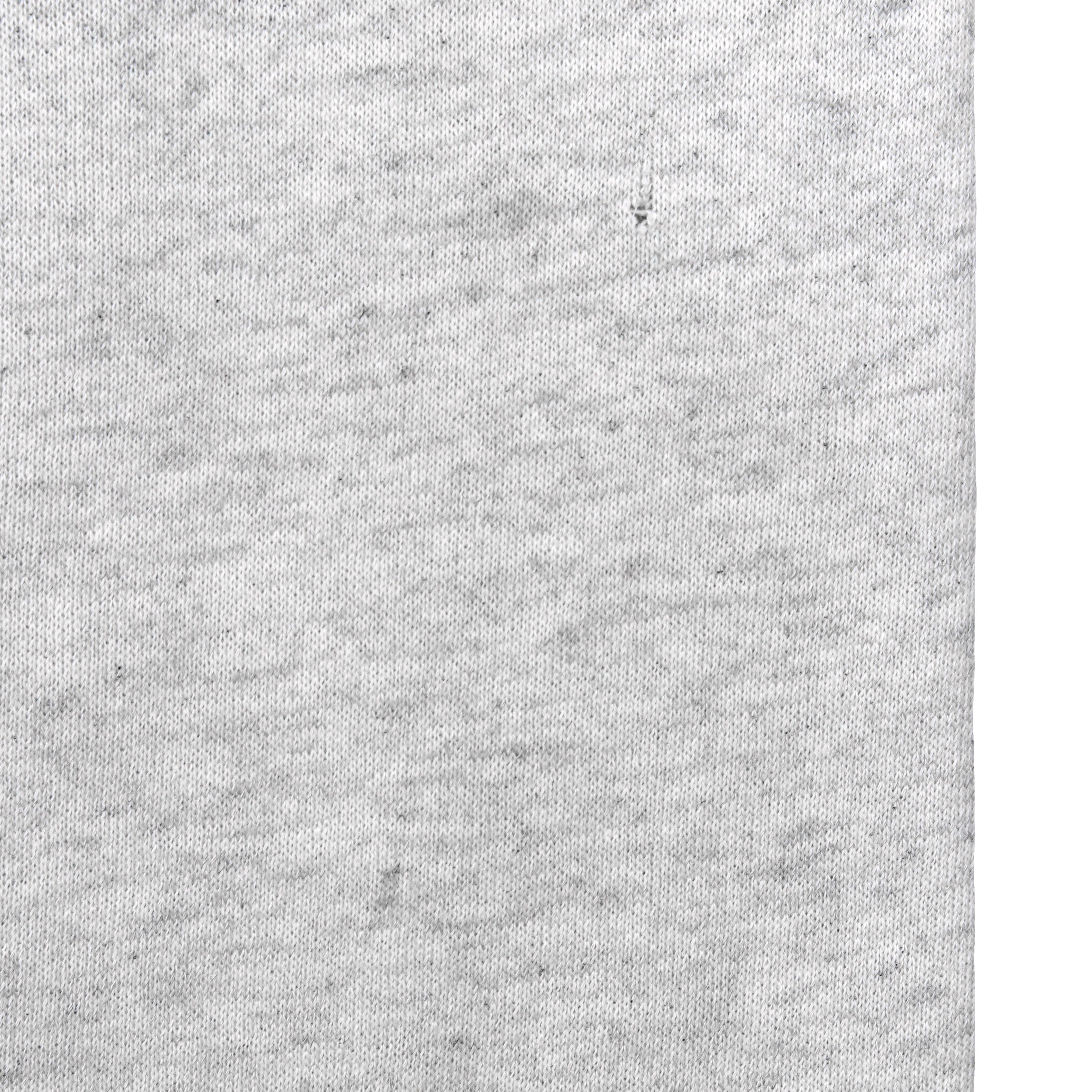 Georgetown Hoyas sweatshirt condition detail showing a minor hole