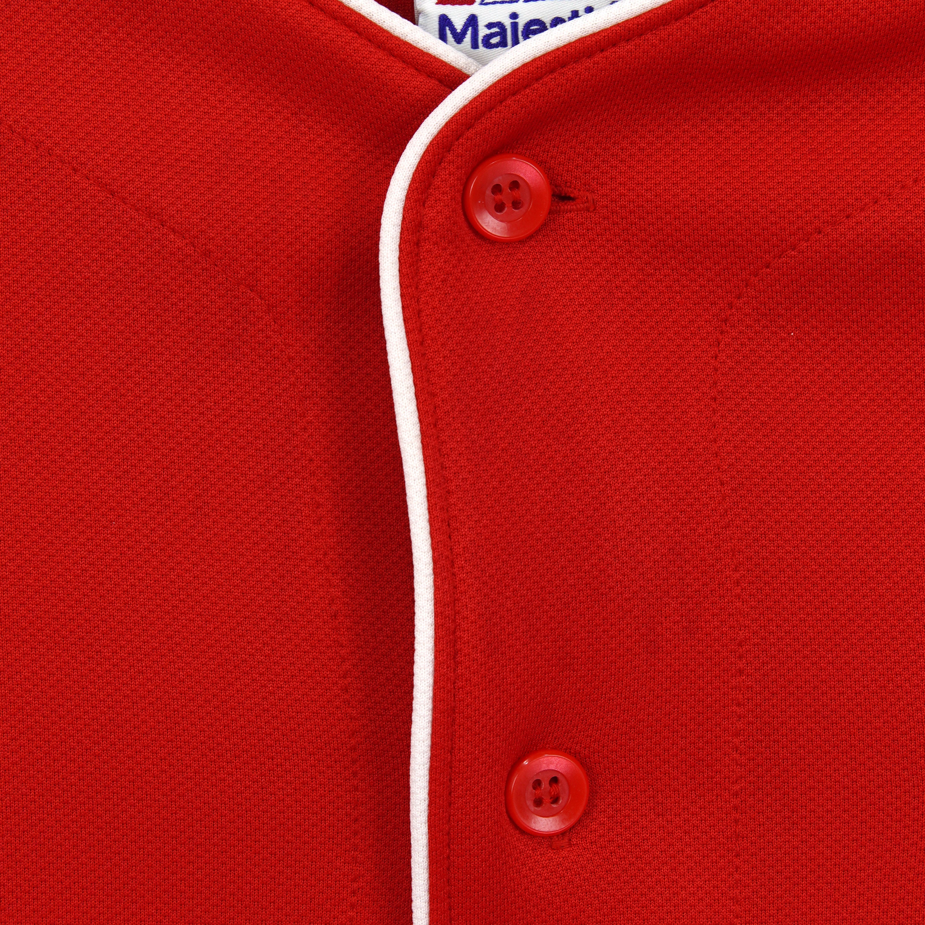 Red front buttons and white piping on the Phillies jersey
