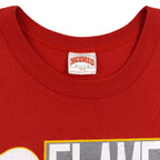 Nutmeg Mills Medium Made in Canada tag on Flames T-shirt