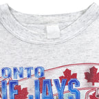 Faded unreadable neck label inside the gray Blue Jays championship sweatshirt