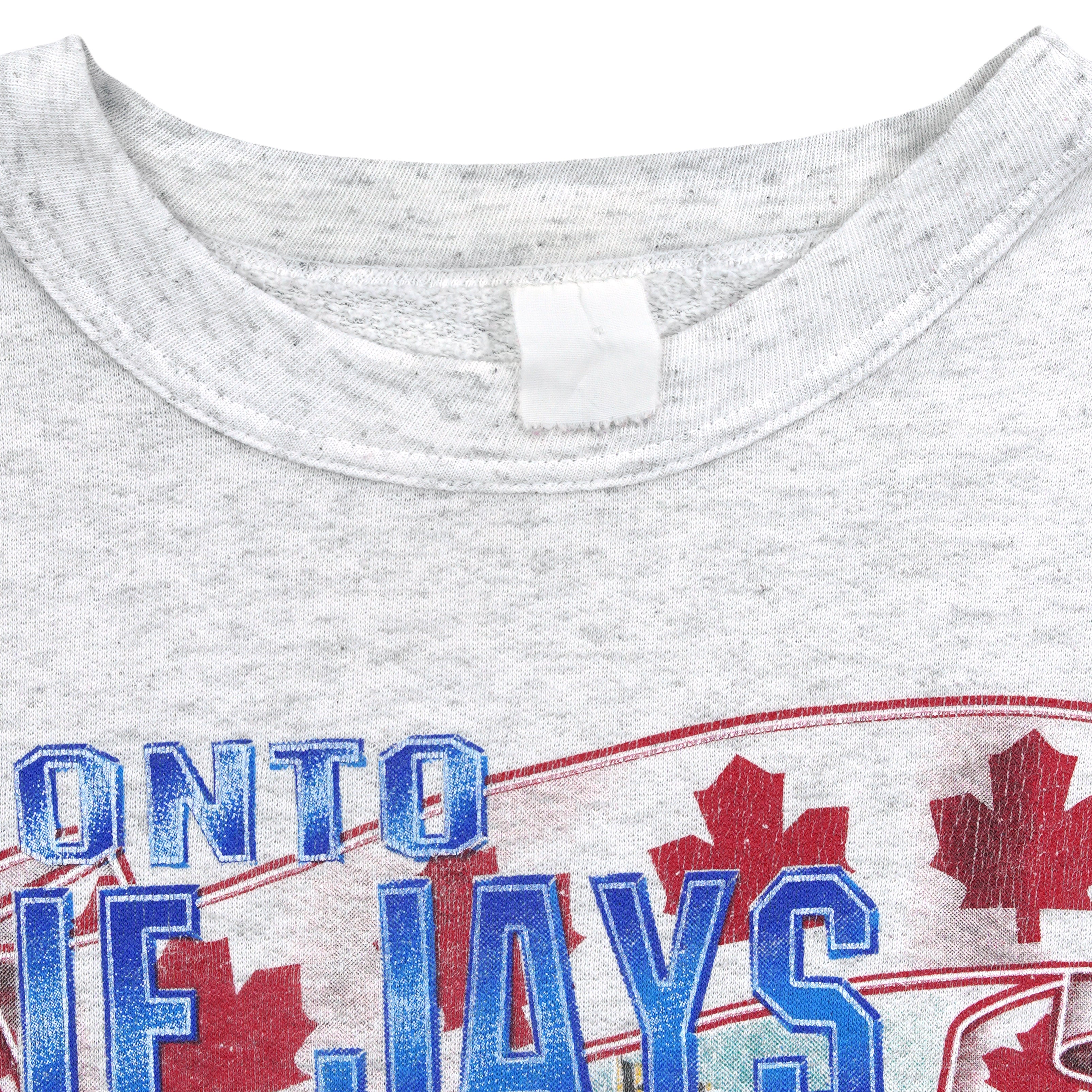 Faded unreadable neck label inside the gray Blue Jays championship sweatshirt