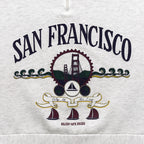 Close-up of the San Francisco Golden Gate Bridge and sailboat front graphic